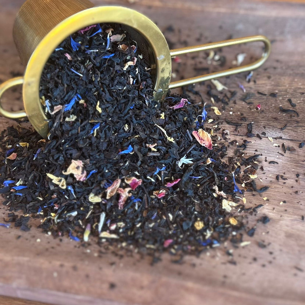Photo du thé Prestige Mangue-Bergamote – Thé noir aux notes de mangue et bergamote, infusion exotique et raffinée.