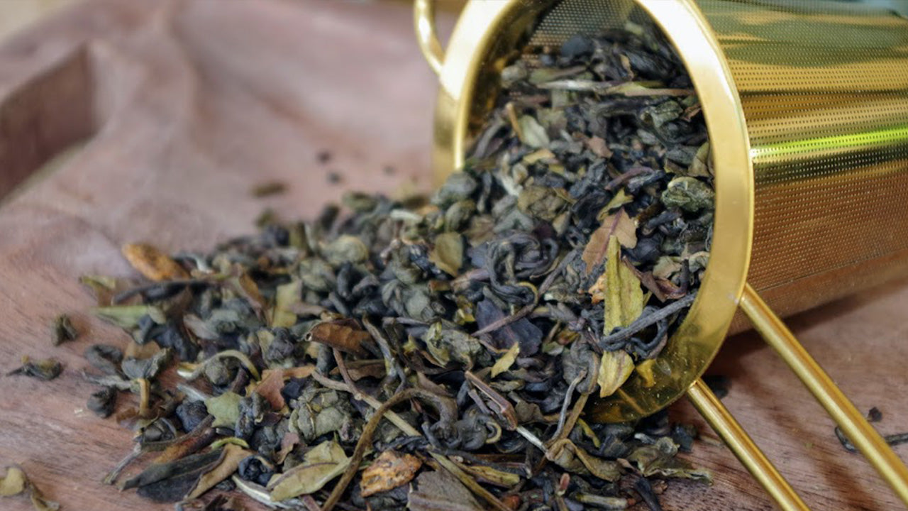 Photo du thé Élixir Tropical – Thé vert aux notes d’ananas et yuzu, infusion détox et rafraîchissante.