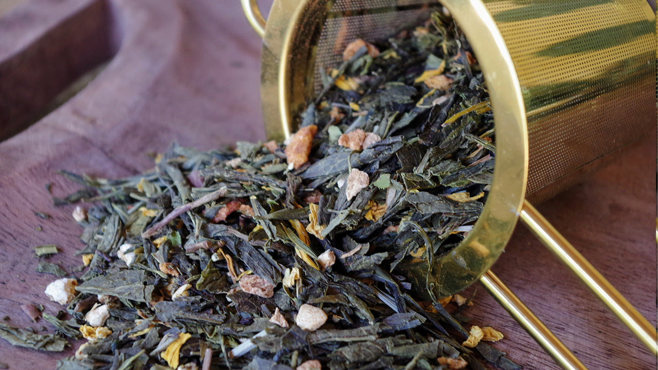 Photo du thé Taille Mannequin – Thé vert aux notes de gingembre et orange, infusion drainante et bien-être.