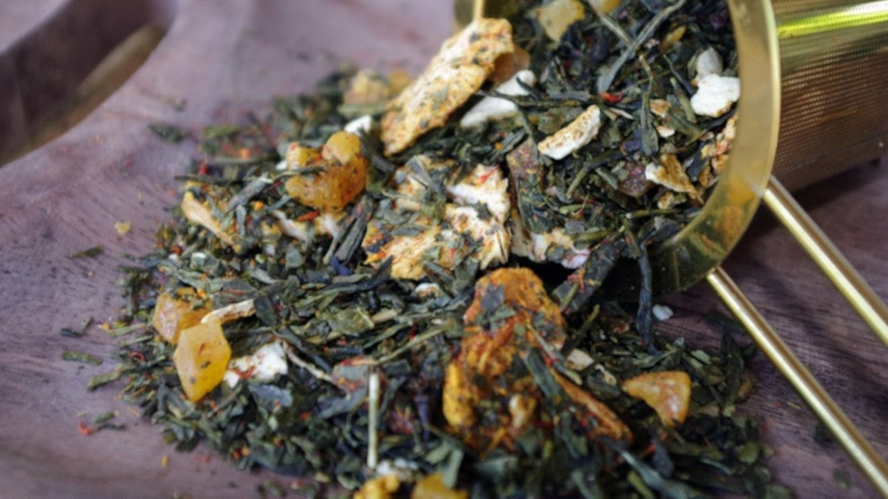 Photo du thé Mango Étoilé – Thé vert aux notes de mangue et carambole, infusion fruitée et ensoleillée.